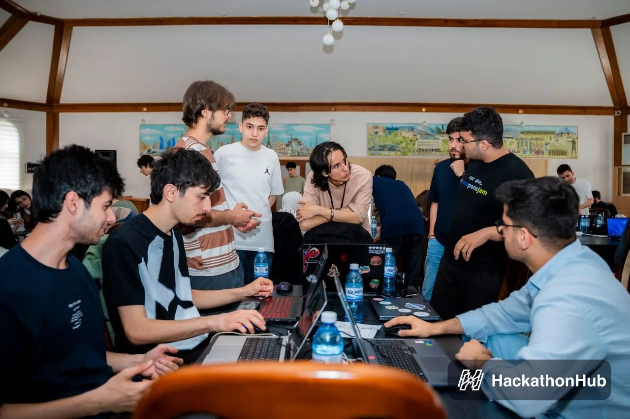 A mentor reviewing progress with a team